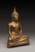 THAILANDE, XIXème siècle
Bouddha maravijaya en bronze laqué or assis en...
