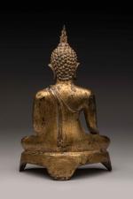 THAILANDE, XIXème siècle
Bouddha maravijaya en bronze laqué or assis en...