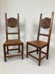Jacques PHILIPPE (1896-1959)Réunion de deux chaises à haut dossier sculptés...
