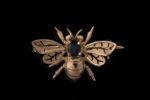 Petite BROCHE en or jaune (750 millièmes) figurant une abeille,...
