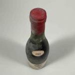 1 bouteille ALOXE CORTON - POTHIER TAVERNIER 1964 Etiquette tachée,...