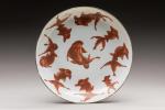 CHINE - Epoque DAOGUANG (1821-1850)
COUPE en porcelaine décorée en rouge...